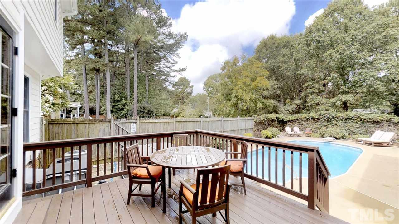 2704 Vestry Way Raleigh, NC 27613 - Photo 2 of 25 a view of a two chairs in the balcony