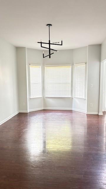 201 Overlook Court Canton, GA 30115 - Photo 4 of 22 an empty room with wooden floor and windows