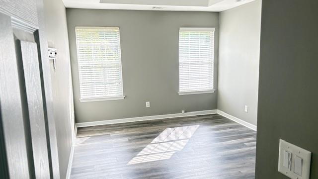 201 Overlook Court Canton, GA 30115 - Photo 9 of 22 a view of an empty room with wooden floor and a window