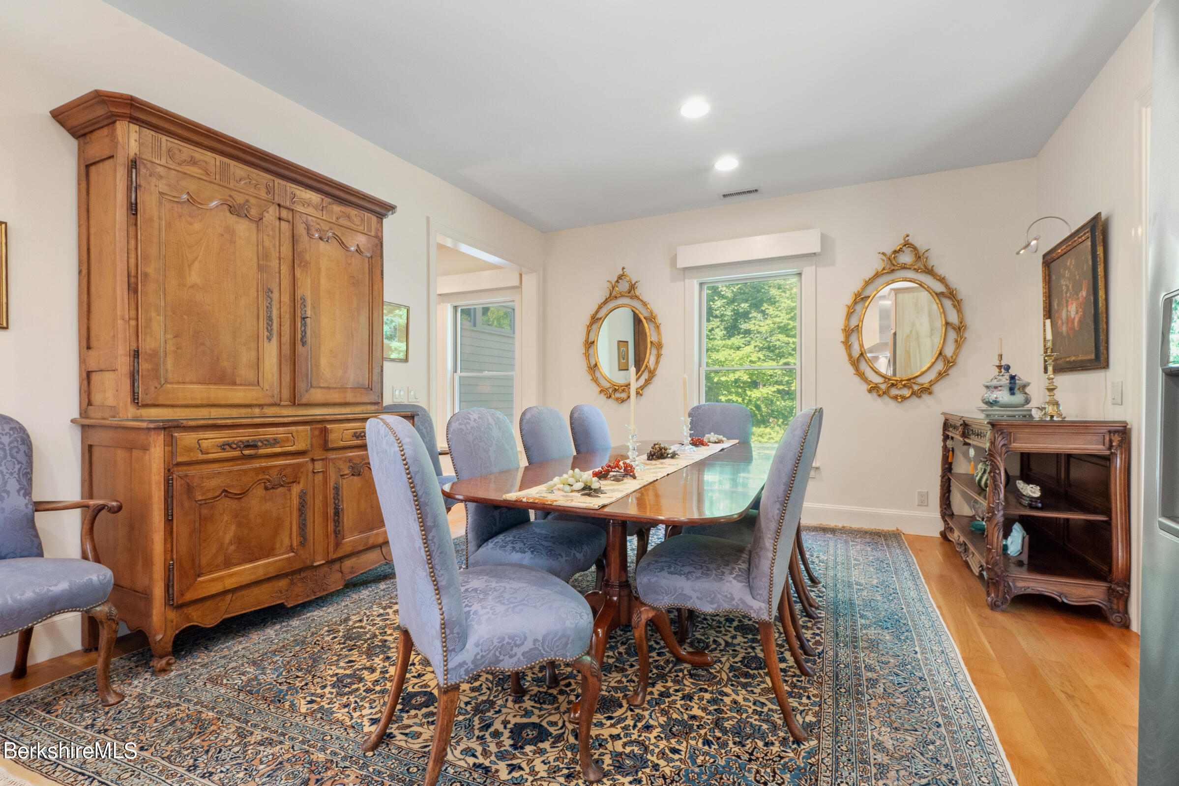 9 East Mountain Road Great Barrington, MA 01230 - Photo 16 of 45 a view of a dining room with furniture window and wooden floor