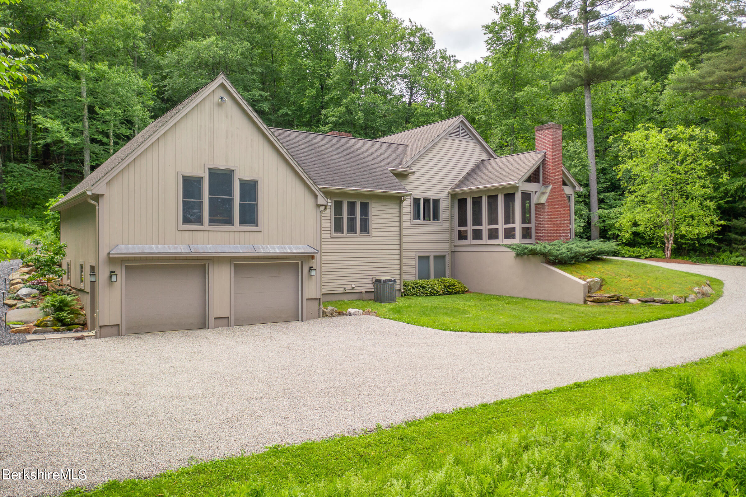 9 East Mountain Road Great Barrington, MA 01230 - Photo 2 of 45 a view of a house with a yard and potted plants