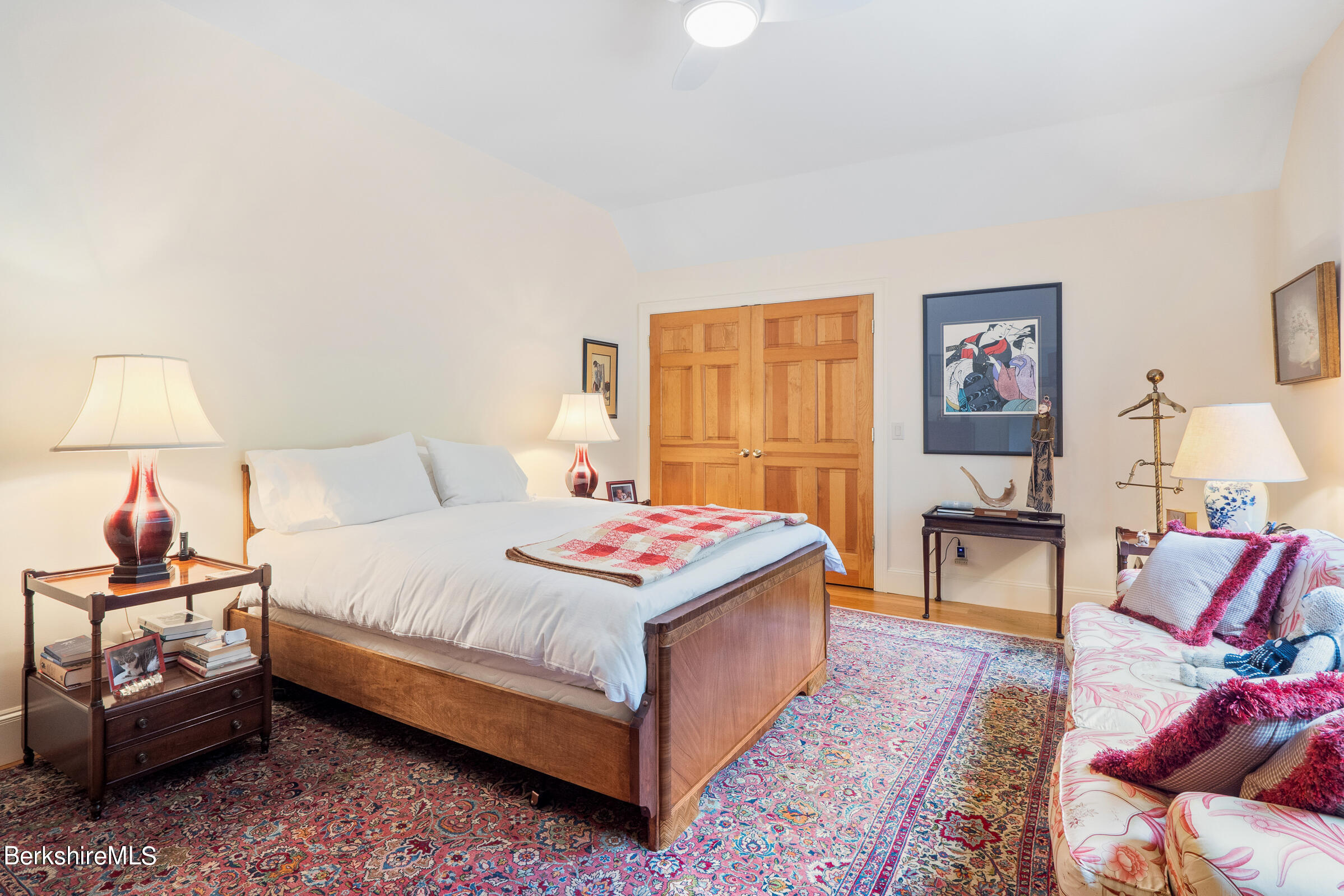 9 East Mountain Road Great Barrington, MA 01230 - Photo 27 of 45 a bedroom with a bed and wooden floor