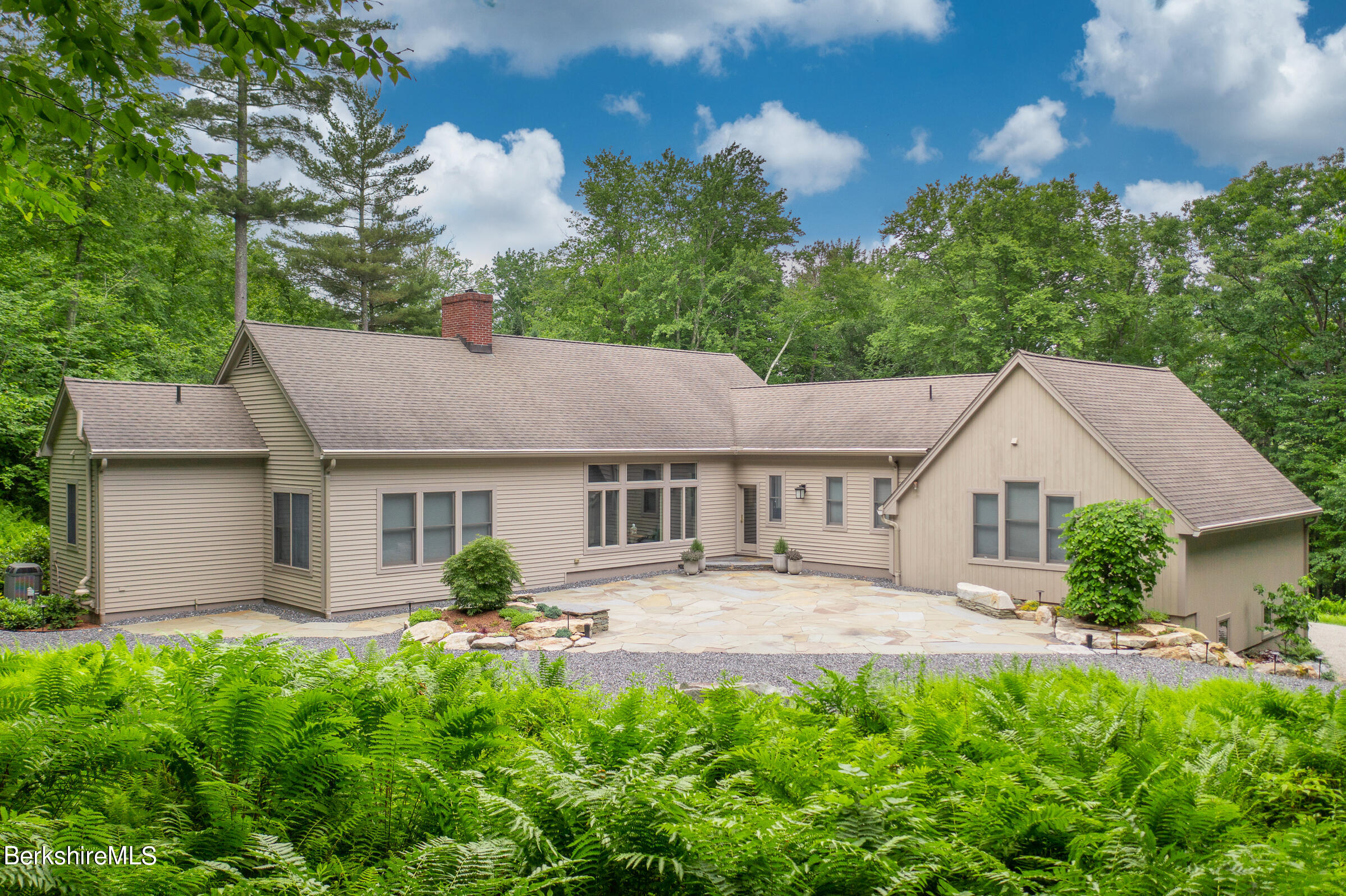 9 East Mountain Road Great Barrington, MA 01230 - Photo 38 of 45 a house view with a garden space