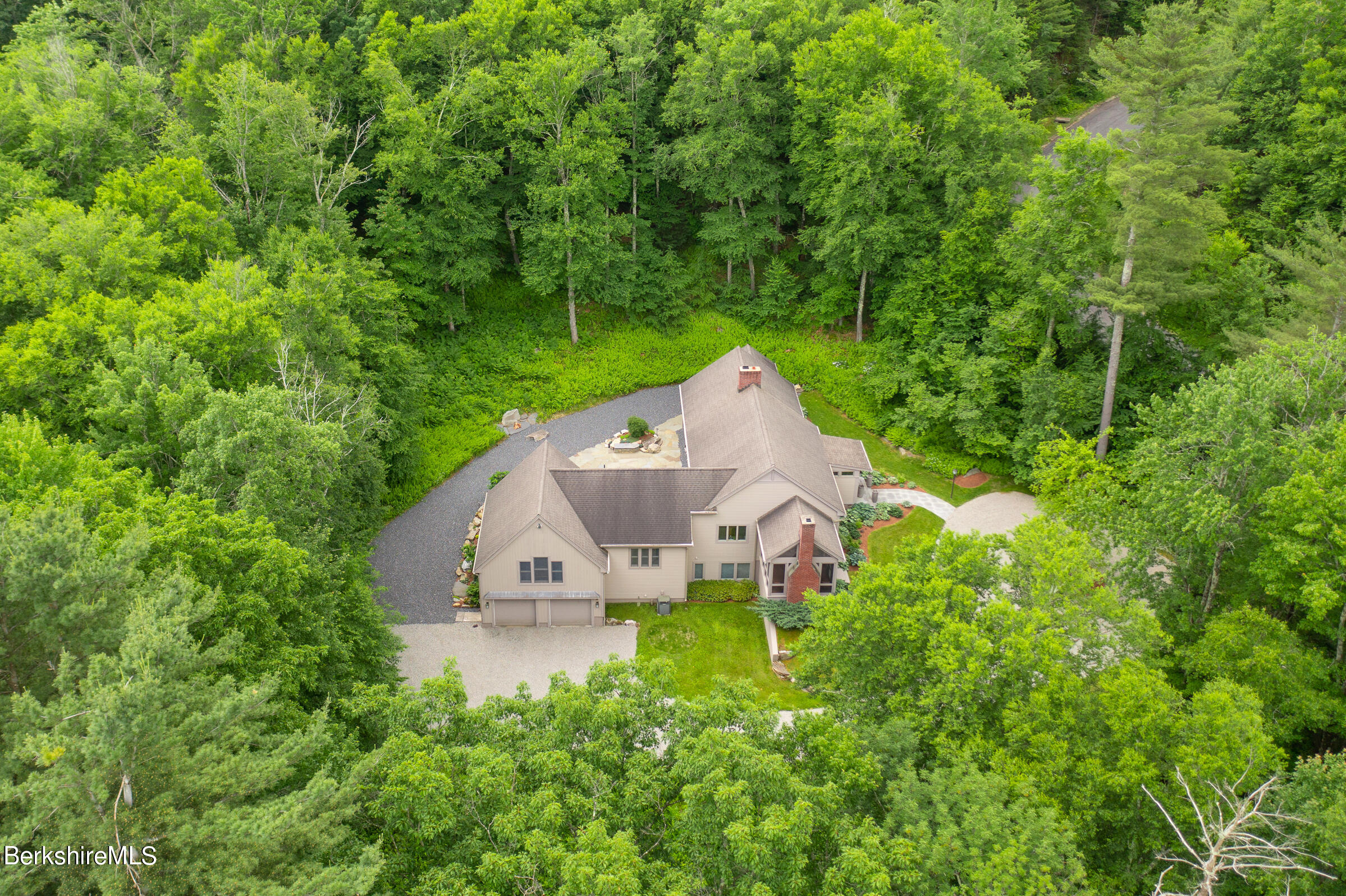 9 East Mountain Road Great Barrington, MA 01230 - Photo 41 of 45 a view of a house with a yard and sitting area