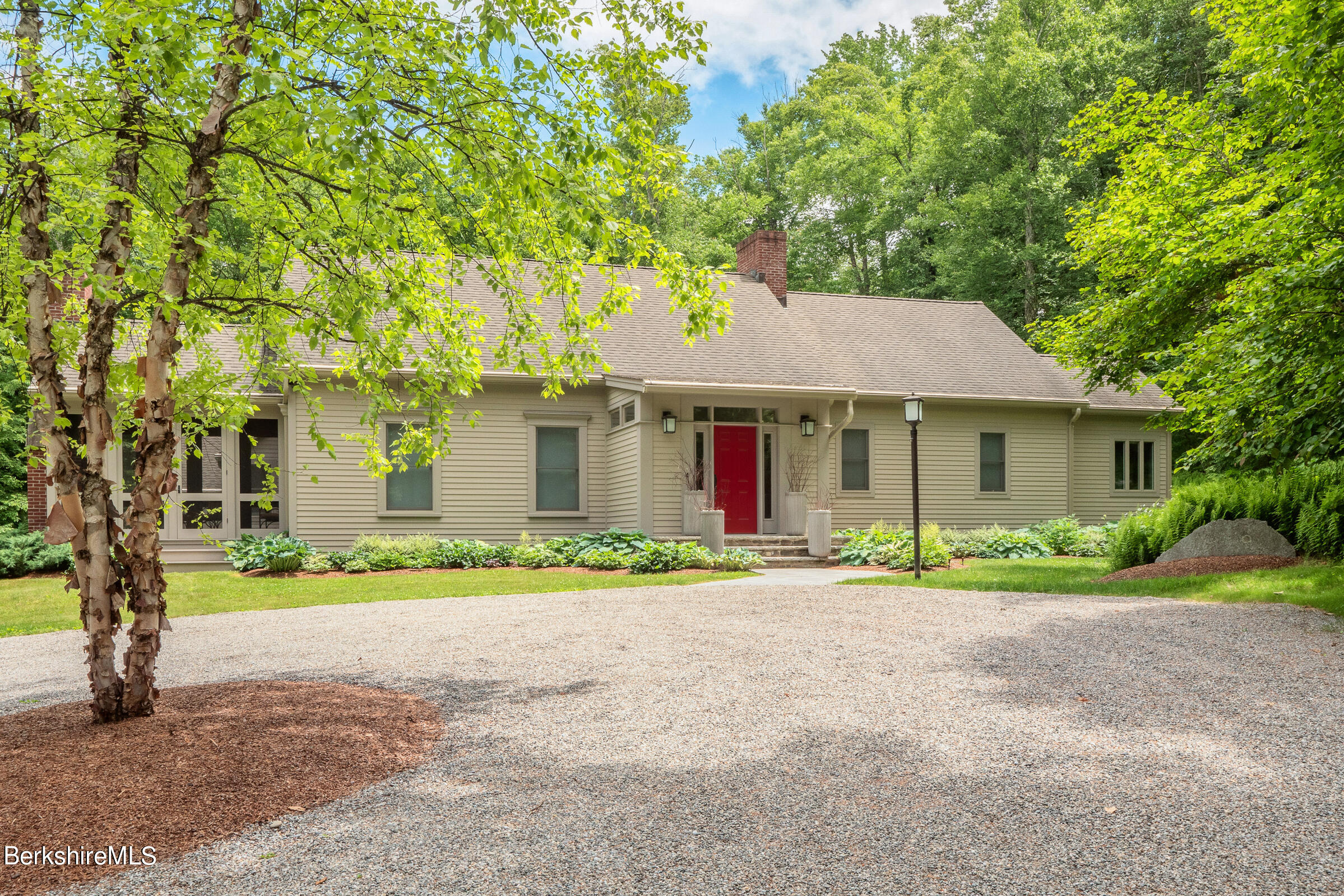 9 East Mountain Road Great Barrington, MA 01230 - Photo 44 of 45 a front view of a house with a yard and trees