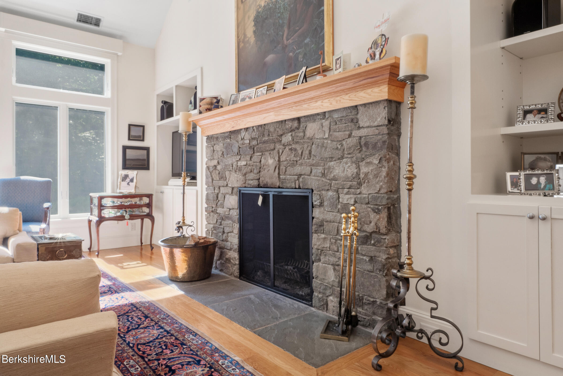 9 East Mountain Road Great Barrington, MA 01230 - Photo 7 of 45 a living room with furniture and a fireplace