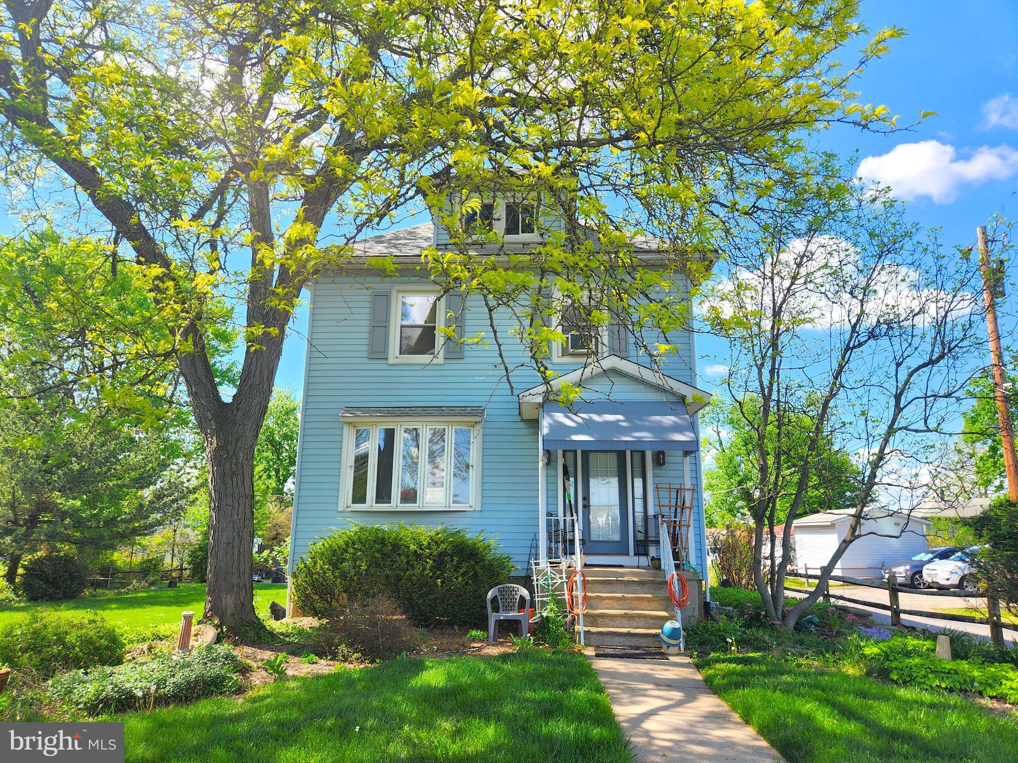 Stately Colonial with an expansive corner lot