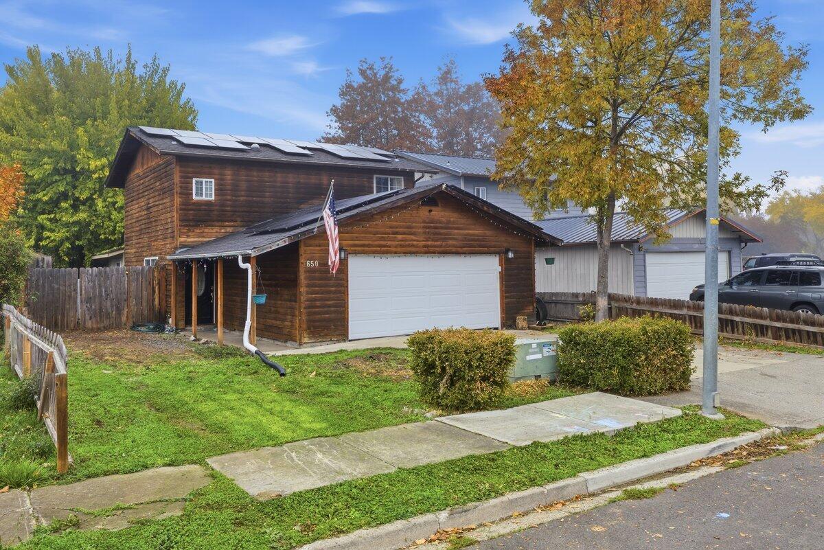 650 Sarah Lane Eagle Point, OR 97524 - Photo 1 of 19 a view of a house with a yard