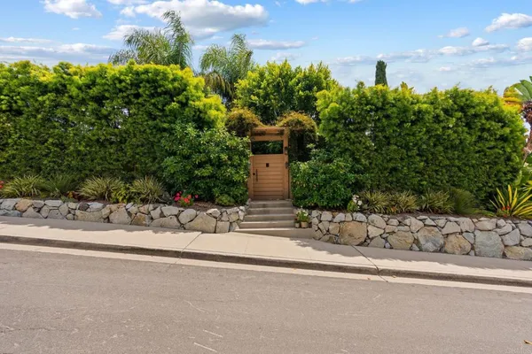 a view of a garden with pathway