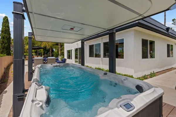 a view of livingroom with furniture and workspace