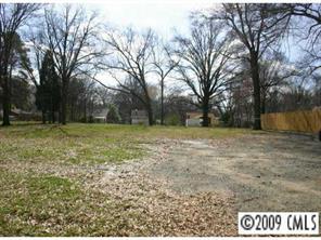 3609 Tuckaseegee Road Charlotte, NC 28208 - Photo 1 of 1 a view of a yard with a tree