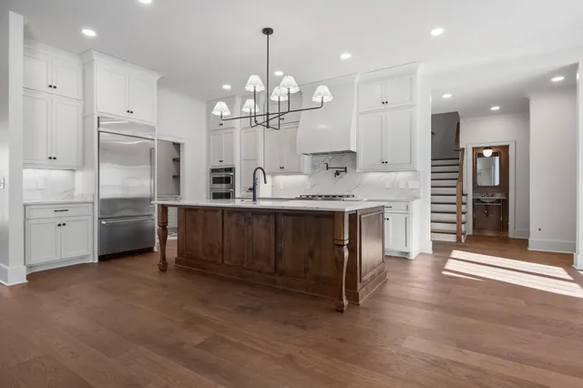a en suite bathroom with a sink and a mirror