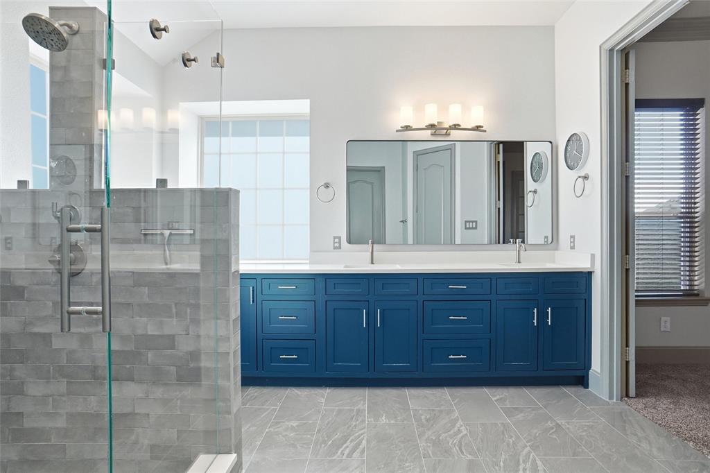 4840 Exposition Way Fort Worth, TX 76244 - Photo 17 of 40 a bathroom with a granite countertop sink and a mirror