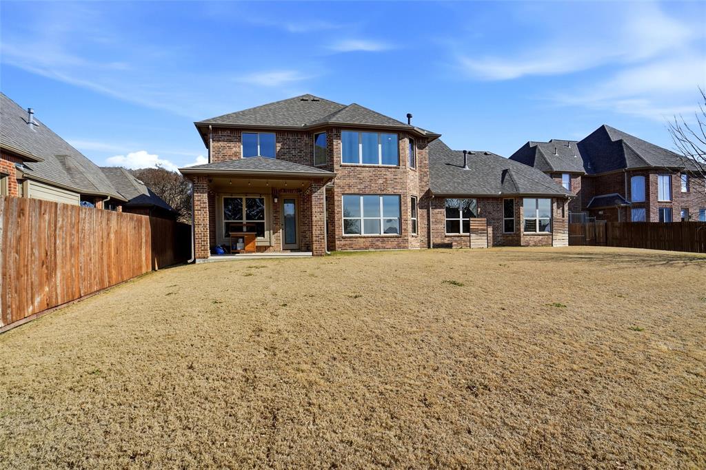 4840 Exposition Way Fort Worth, TX 76244 - Photo 19 of 40 a front view of a house with a yard