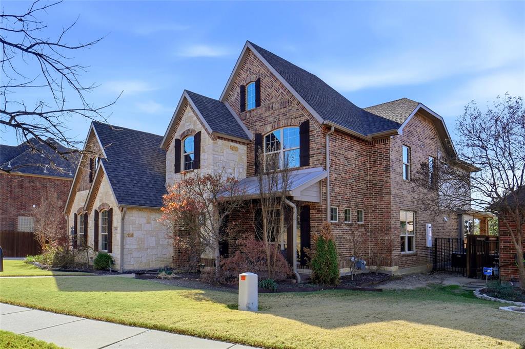 4840 Exposition Way Fort Worth, TX 76244 - Photo 2 of 40 a front view of a house with garden