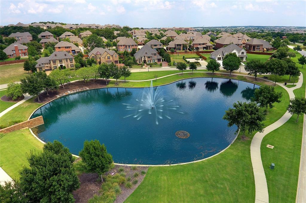 4840 Exposition Way Fort Worth, TX 76244 - Photo 31 of 40 an aerial view of a house with a yard and lake view