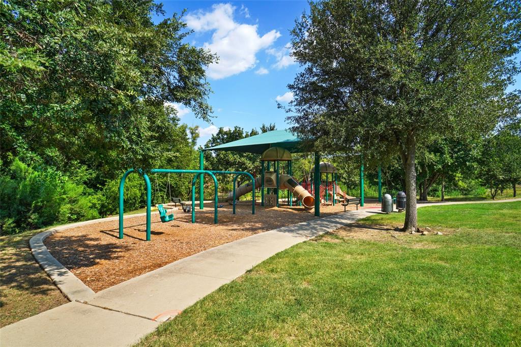 4840 Exposition Way Fort Worth, TX 76244 - Photo 39 of 40 a view of a park with swings and slides