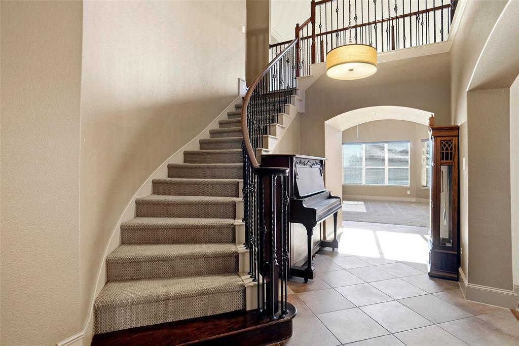 4840 Exposition Way Fort Worth, TX 76244 - Photo 4 of 40 a view of entryway and hall with wooden floor
