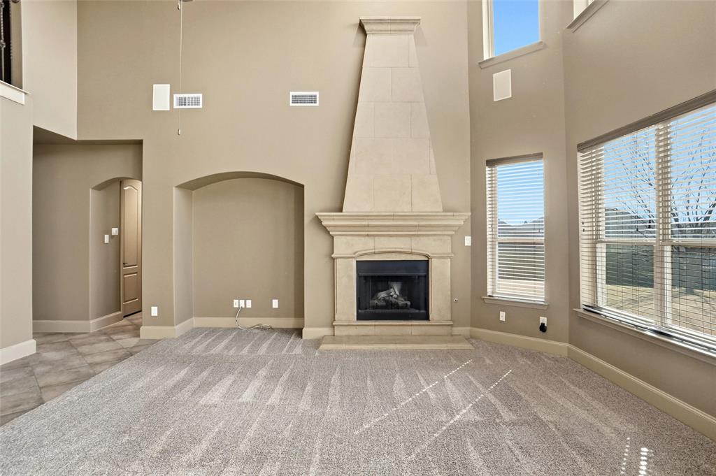 4840 Exposition Way Fort Worth, TX 76244 - Photo 7 of 40 a view of livingroom with a fireplace