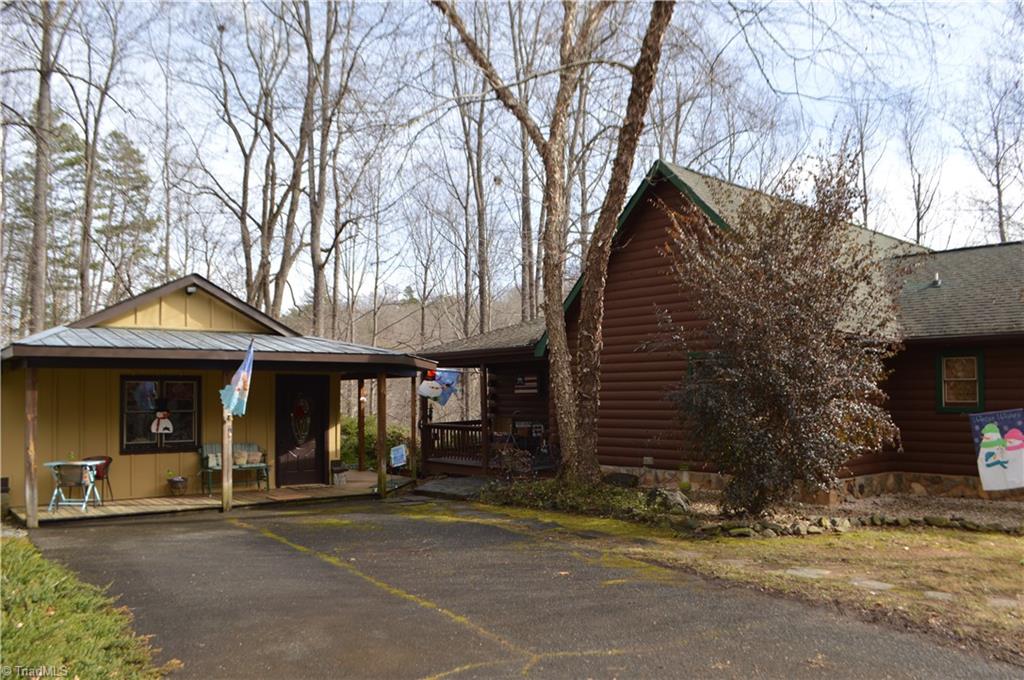 551 Jackson Rd Extension Mount Airy, NC 27030 - Photo 7 of 49 Log Cabin on the River with a guest house!