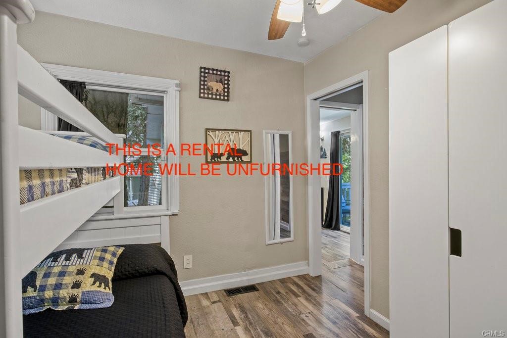 23882 Springwater Road Crestline, CA 92325 - Photo 23 of 39 a view of livingroom with furniture and stairs