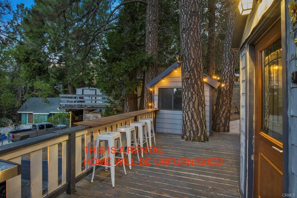 23882 Springwater Road Crestline, CA 92325 - Photo 3 of 39 a view of balcony with furniture