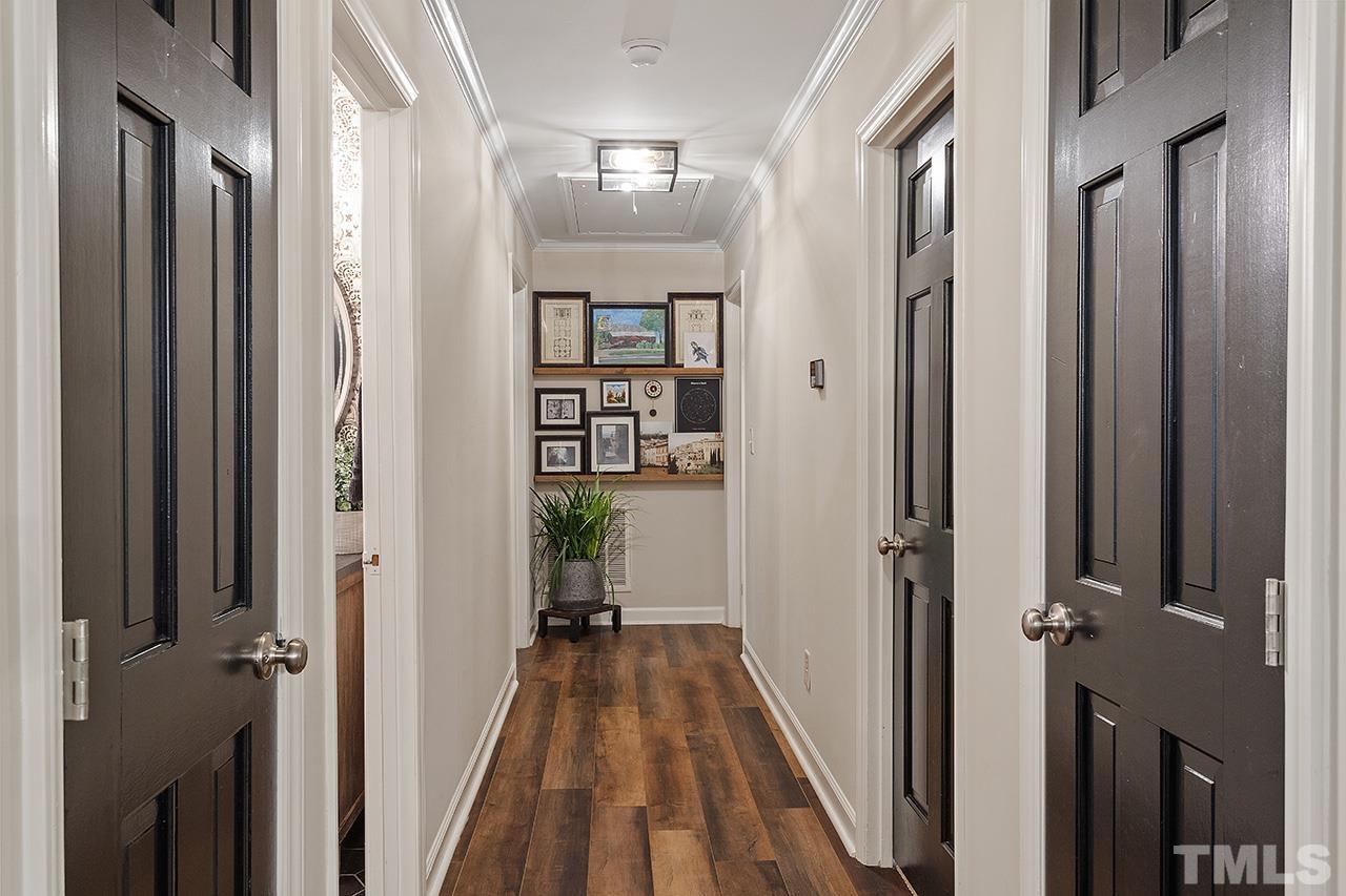 11605 Durant Road Raleigh, NC 27614 - Photo 20 of 42 a view of a hallway with a dining room