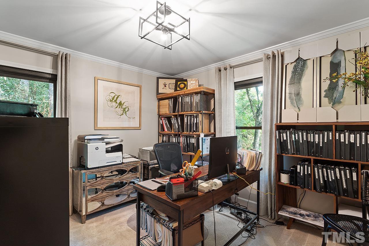 11605 Durant Road Raleigh, NC 27614 - Photo 29 of 42 a living room with furniture a rug and a window