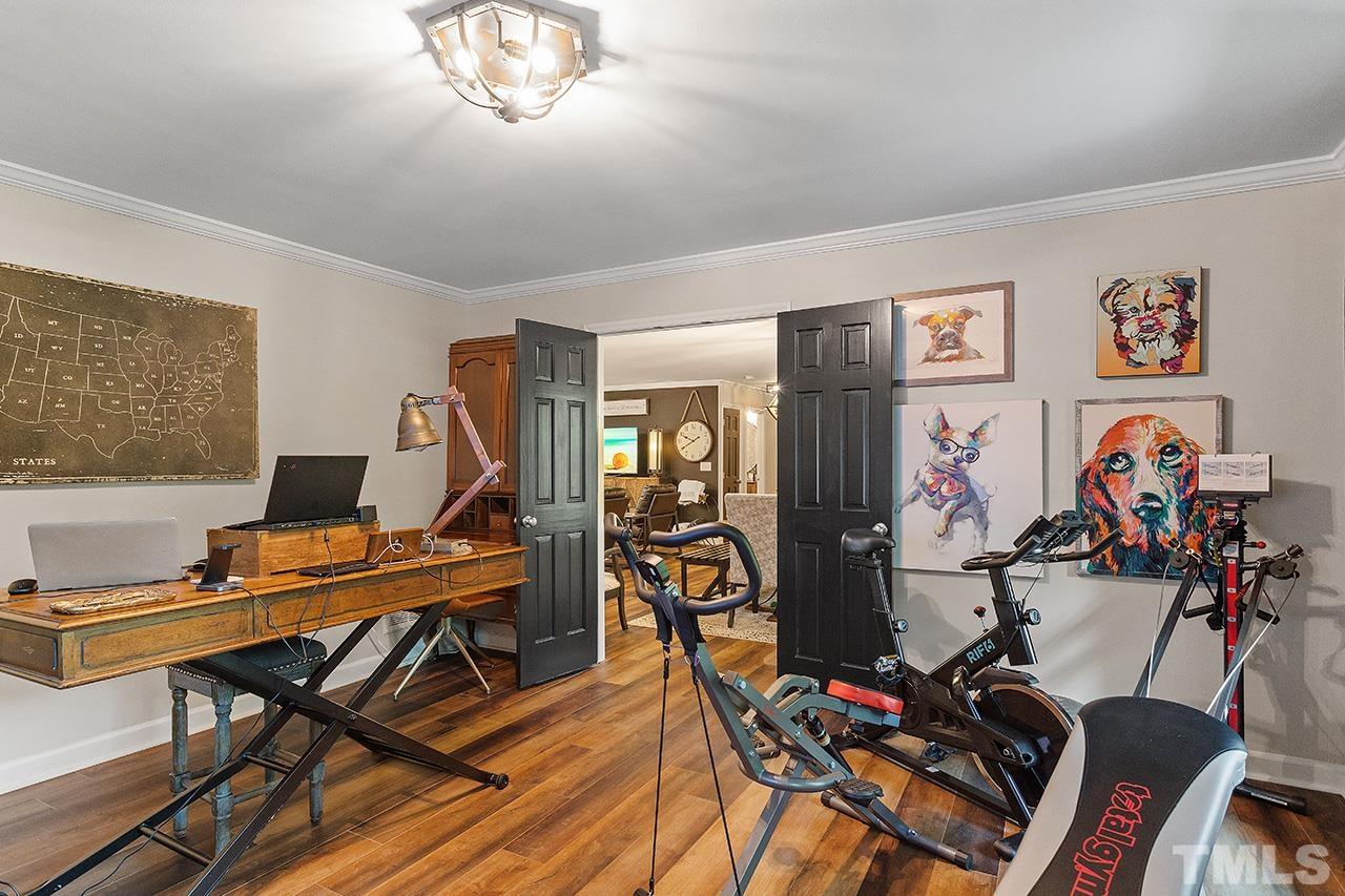 11605 Durant Road Raleigh, NC 27614 - Photo 30 of 42 a view of a room with gym equipment