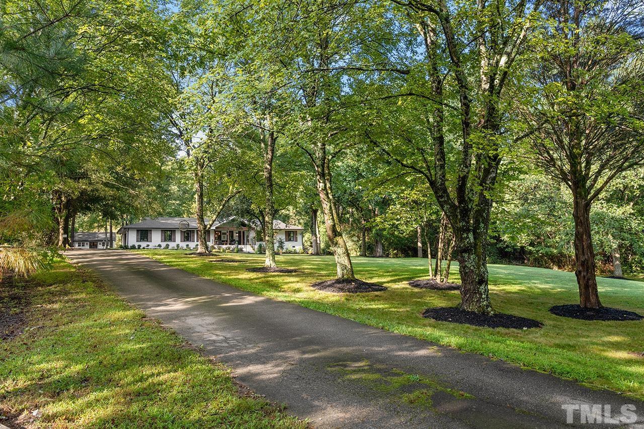11605 Durant Road Raleigh, NC 27614 - Photo 3 of 42 a view of a park with large trees