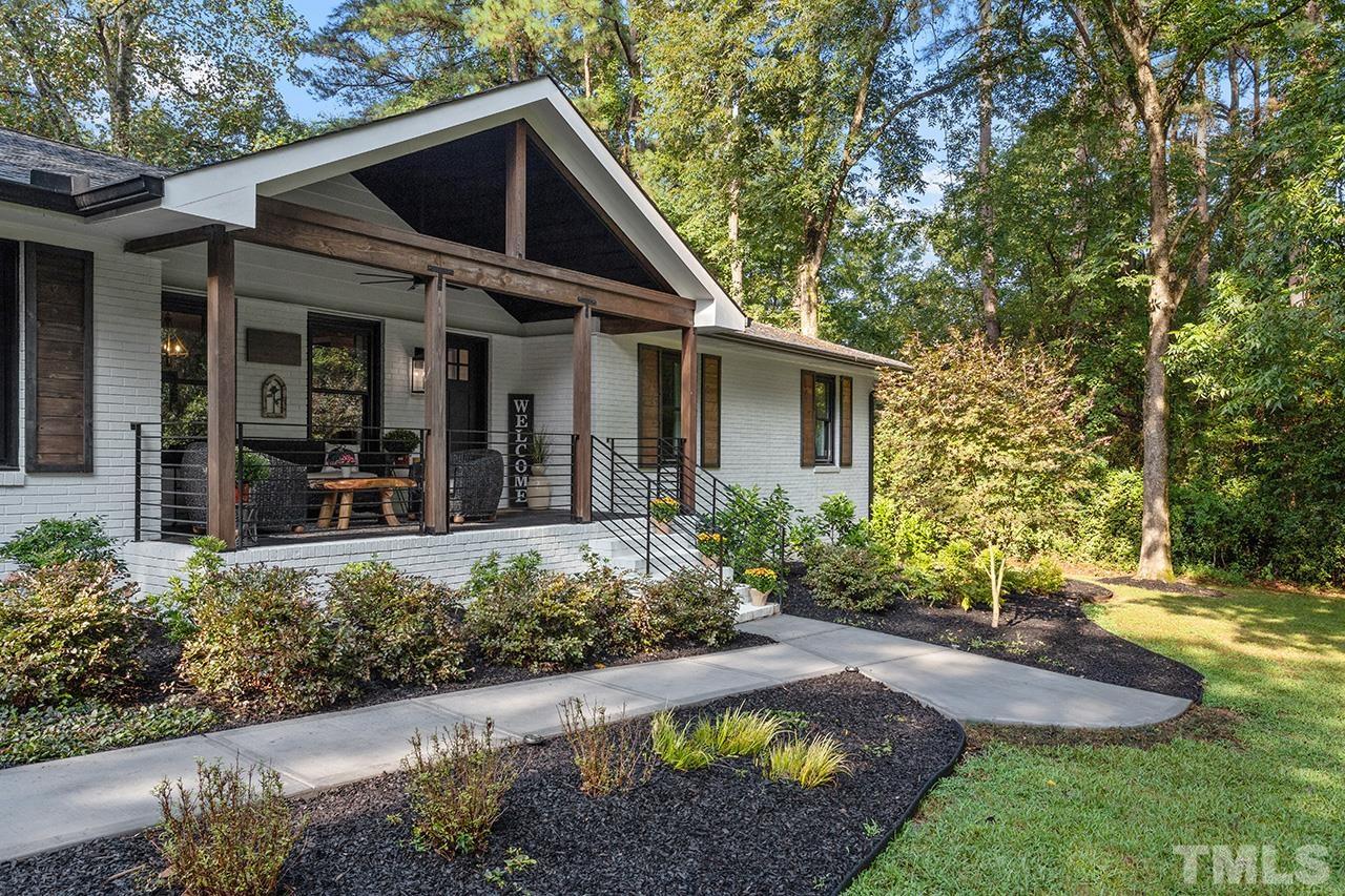 11605 Durant Road Raleigh, NC 27614 - Photo 6 of 42 a front view of a house with garden