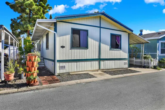 a view of a house with a garage