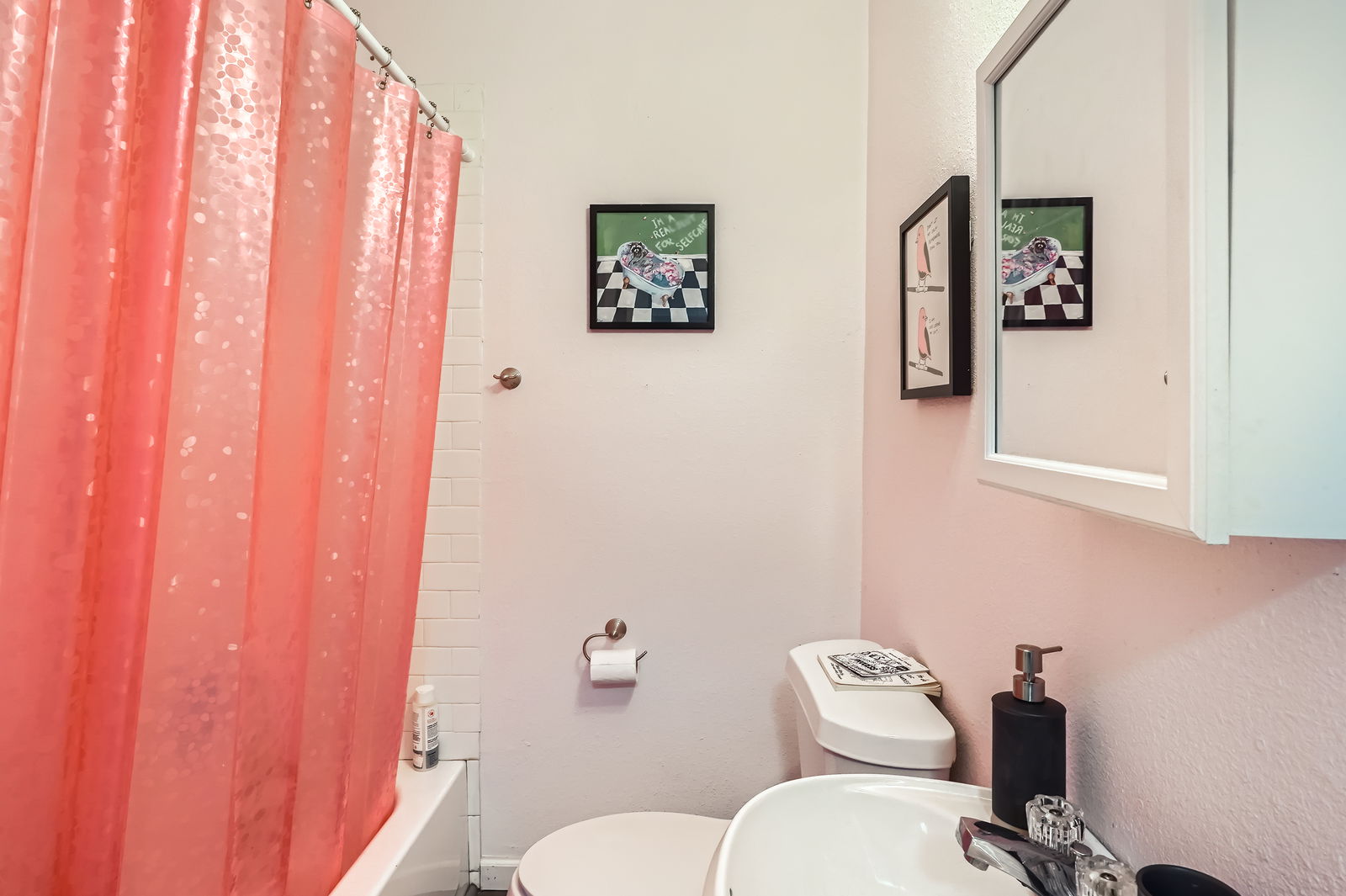 5605 Tura Lane Austin, TX 78721 - Photo 8 of 11 Bathroom with shower / bathtub combination with curtain and toilet