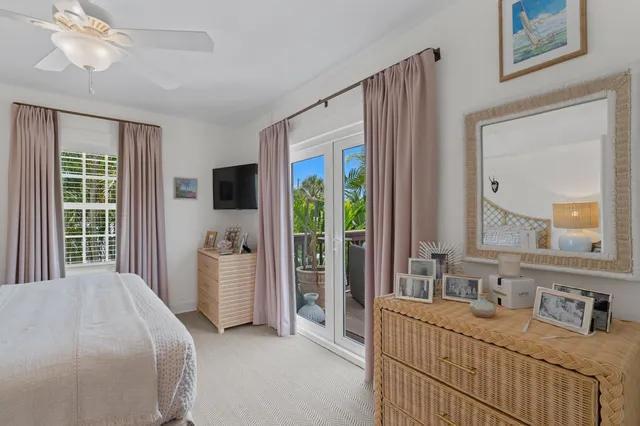 a bedroom with furniture and a window