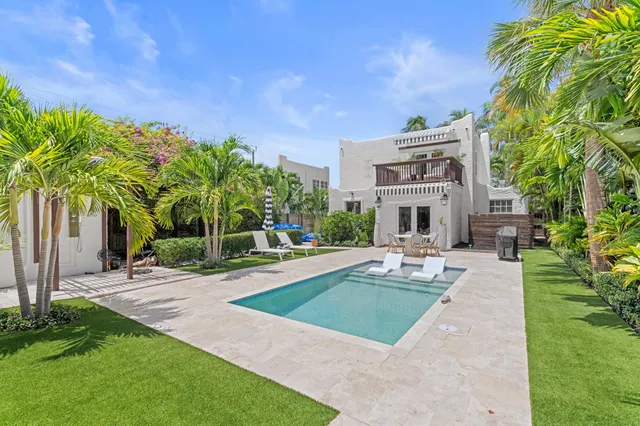 a building with trees in front of it