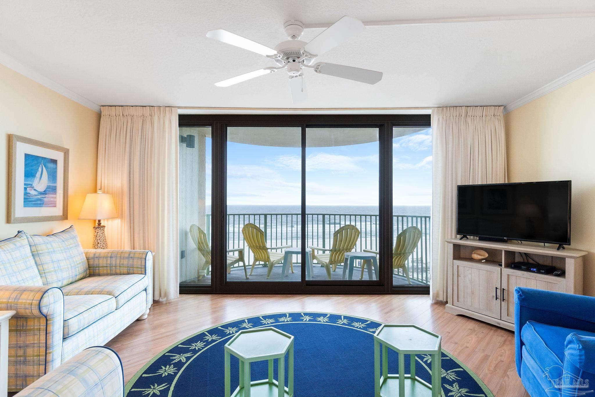 16785 Perdido Key Drive, Unit 503 Perdido Key, FL 32507 - Photo 2 of 38 a living room with furniture and a flat screen tv