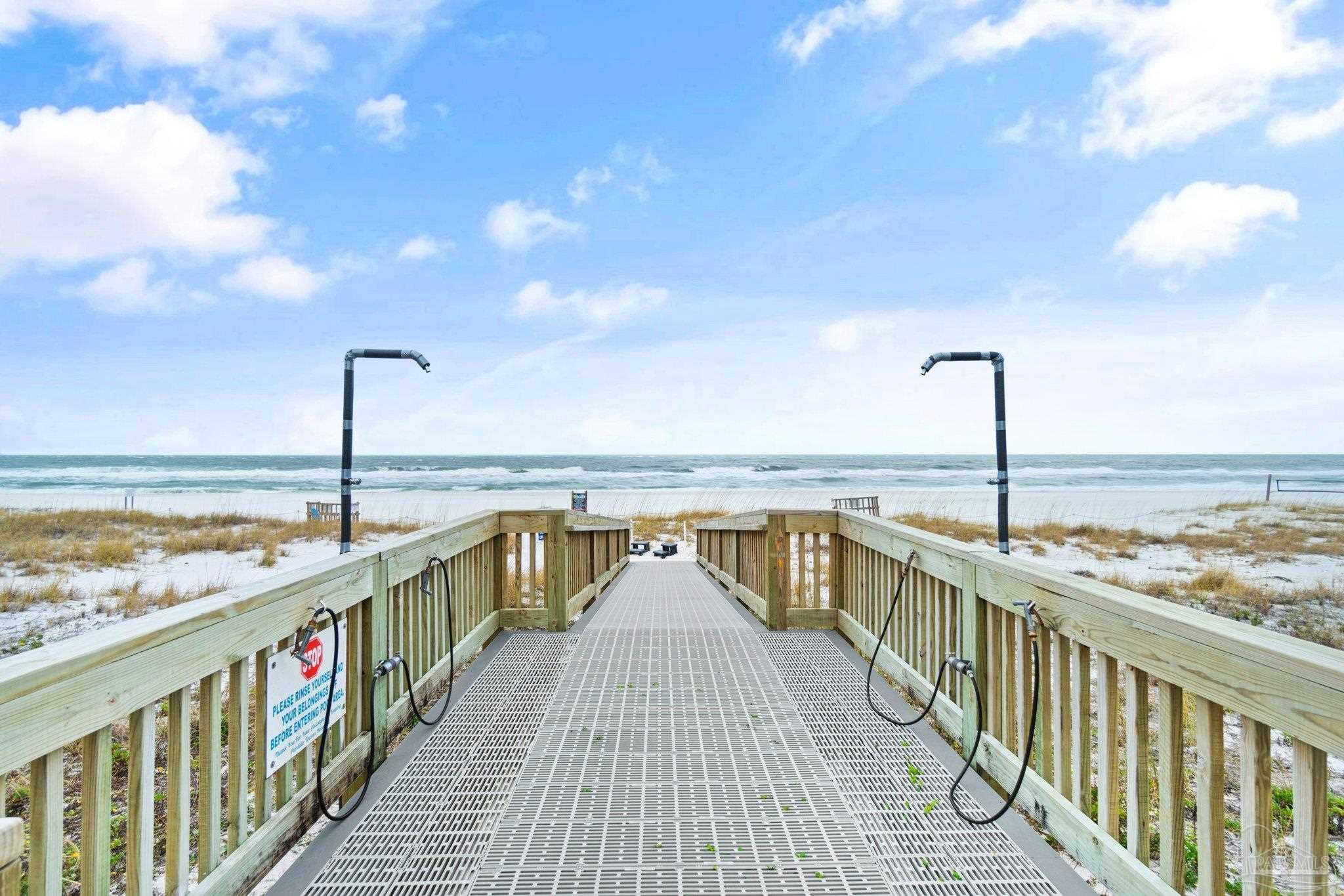 16785 Perdido Key Drive, Unit 503 Perdido Key, FL 32507 - Photo 32 of 38 a view of a balcony with wooden floor & fence