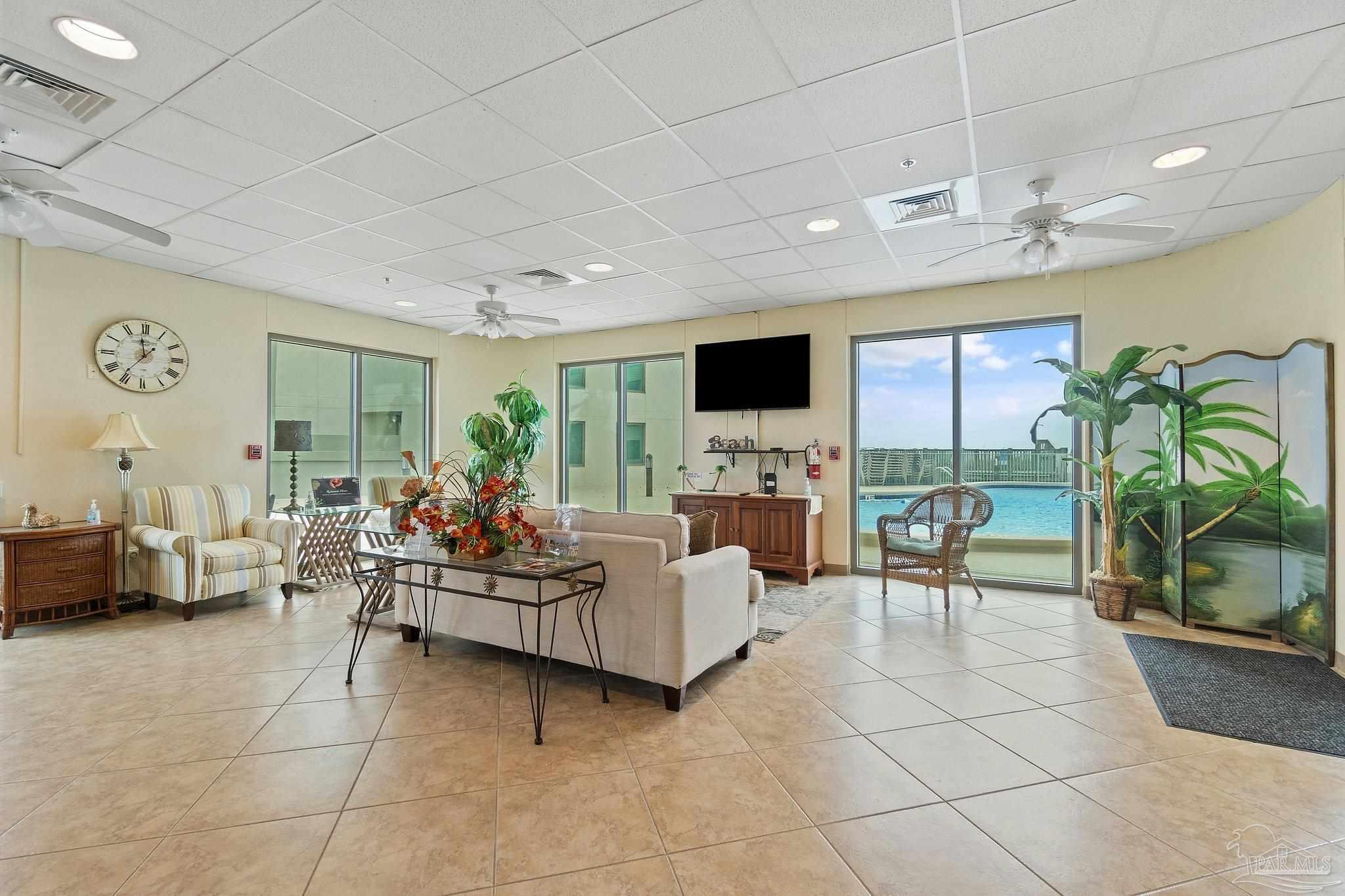 16785 Perdido Key Drive, Unit 503 Perdido Key, FL 32507 - Photo 36 of 38 a living room with furniture and a flat screen tv