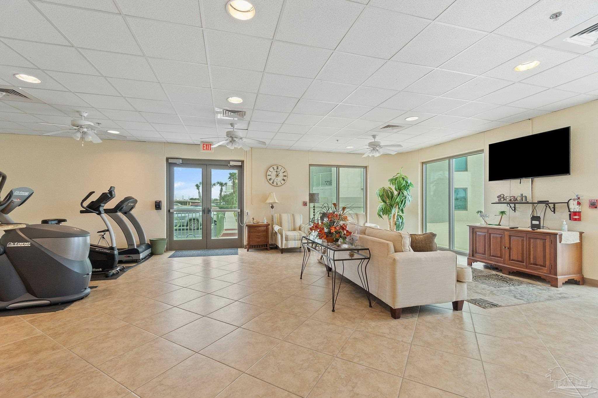 16785 Perdido Key Drive, Unit 503 Perdido Key, FL 32507 - Photo 37 of 38 a living room with furniture and a flat screen tv