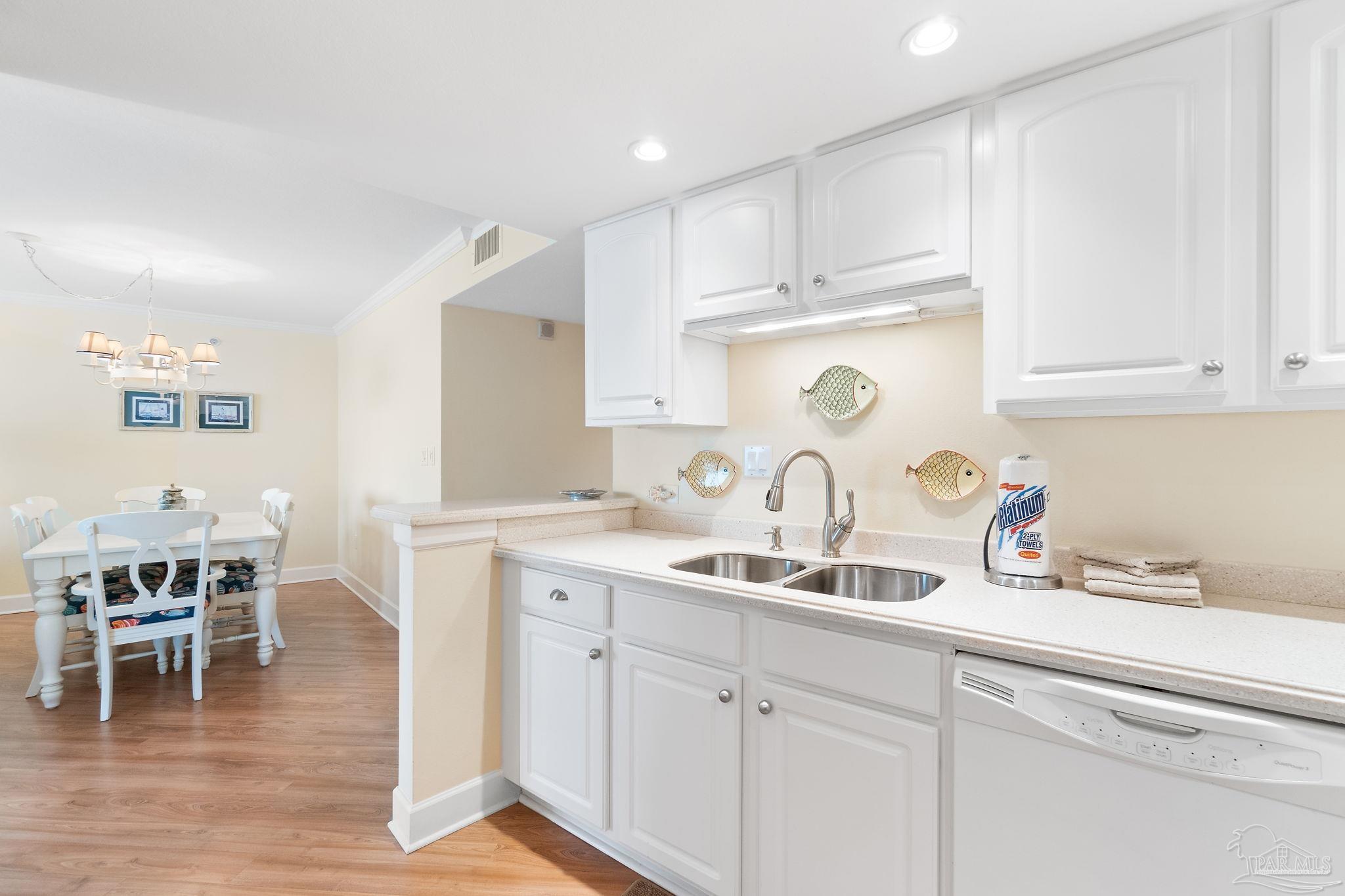 16785 Perdido Key Drive, Unit 503 Perdido Key, FL 32507 - Photo 6 of 38 a kitchen with a sink and cabinets