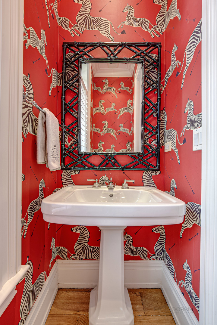 680 South Ridge Road Lake Forest, IL 60045 - Photo 16 of 44 a utility room with red wall paint and a painting on the wall