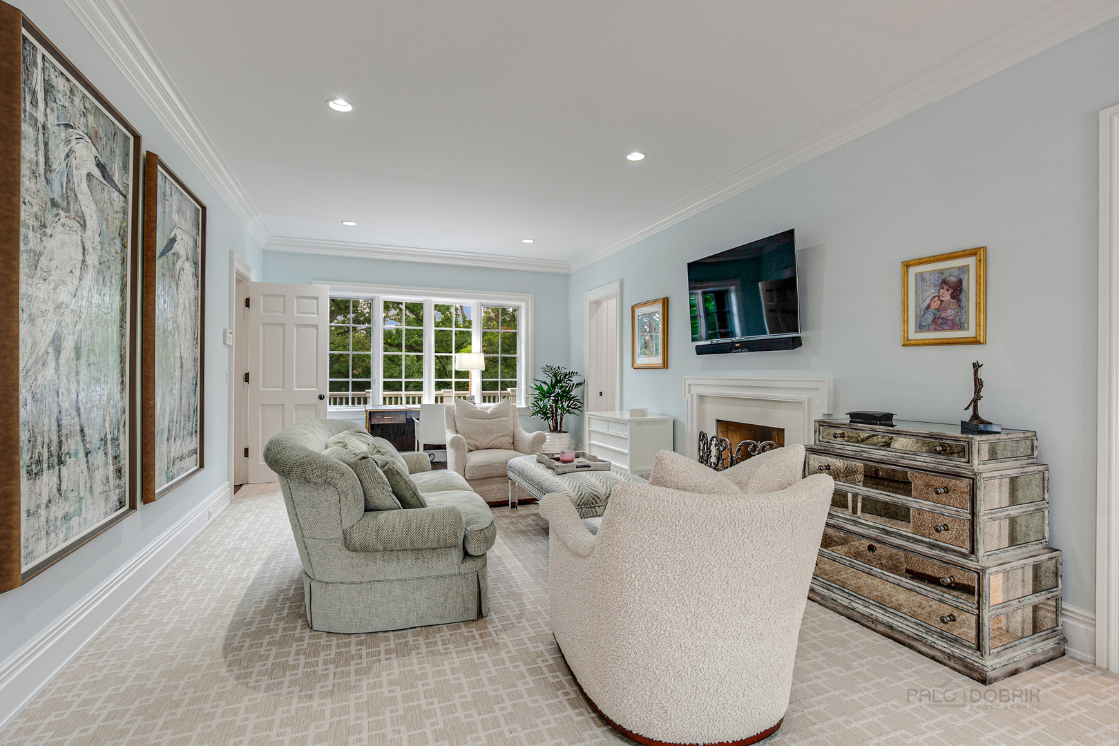 680 South Ridge Road Lake Forest, IL 60045 - Photo 21 of 44 a living room with furniture a flat screen tv and a large window