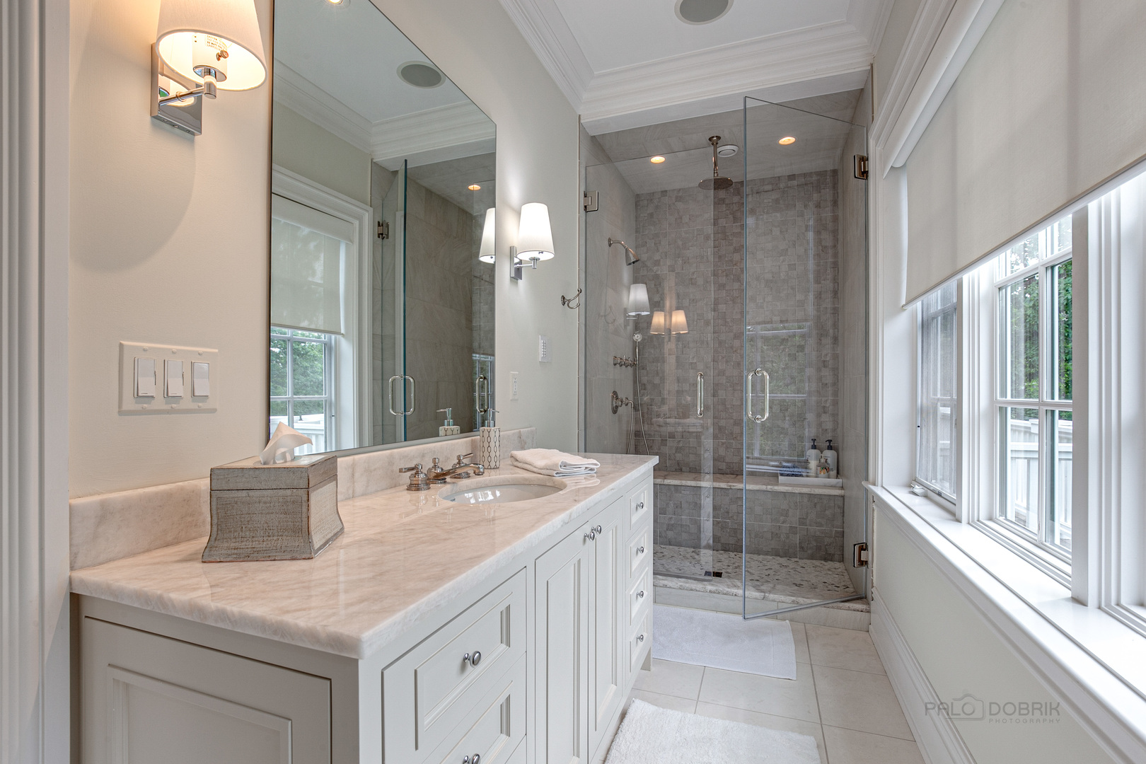 680 South Ridge Road Lake Forest, IL 60045 - Photo 24 of 44 a bathroom with a sink a shower and a mirror