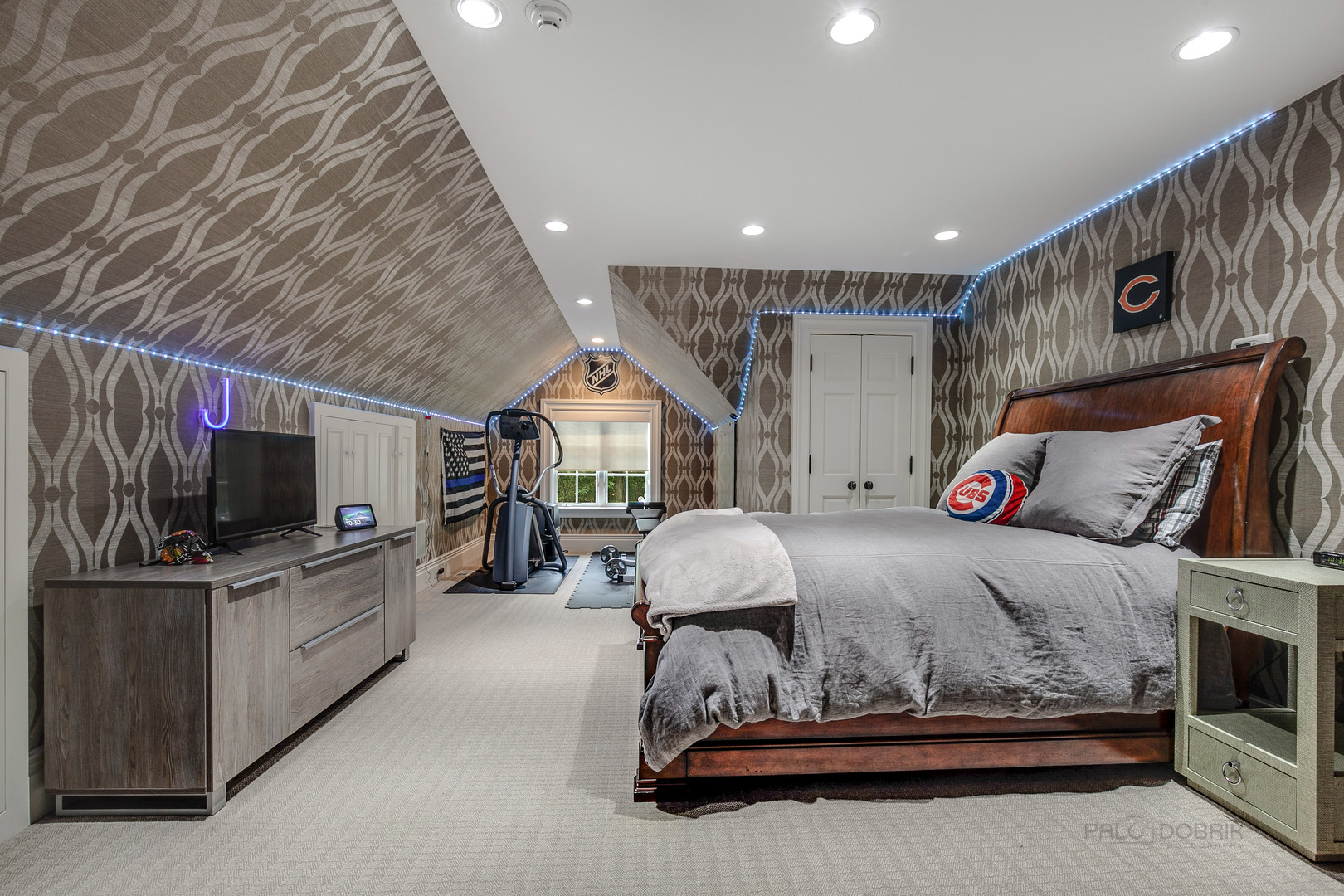 680 South Ridge Road Lake Forest, IL 60045 - Photo 26 of 44 a bedroom with a bed and flat screen tv