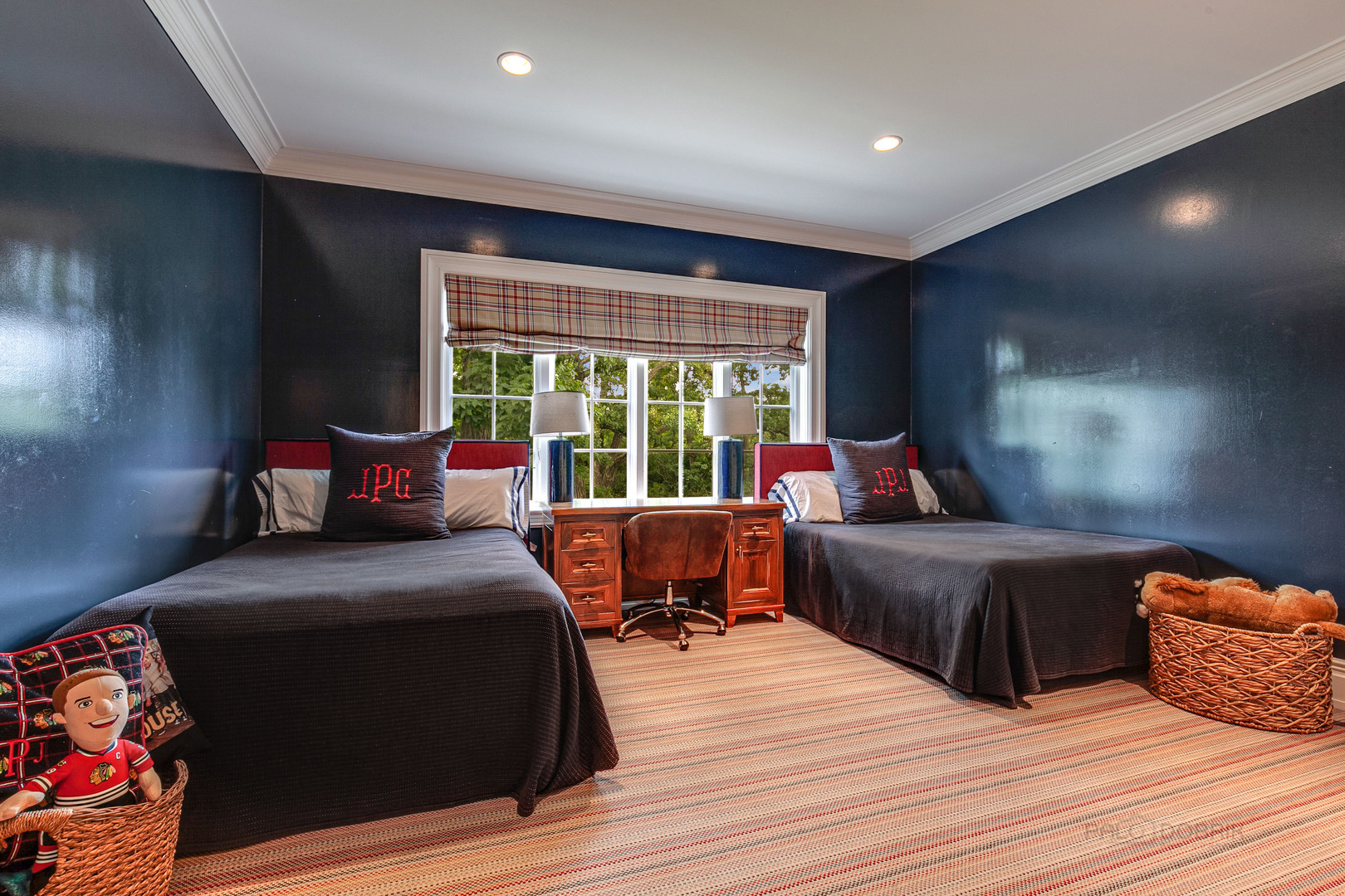 680 South Ridge Road Lake Forest, IL 60045 - Photo 29 of 44 a bedroom with a bed and wooden floor