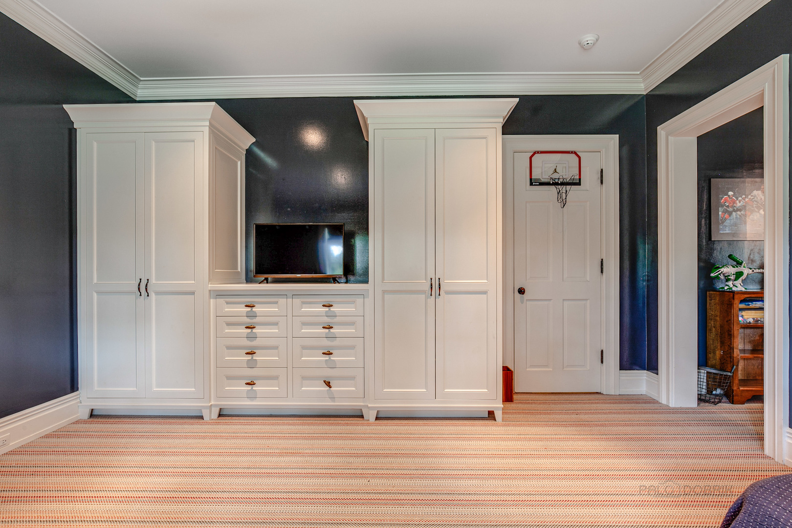 680 South Ridge Road Lake Forest, IL 60045 - Photo 30 of 44 a view of an empty room with wooden floor and cabinet