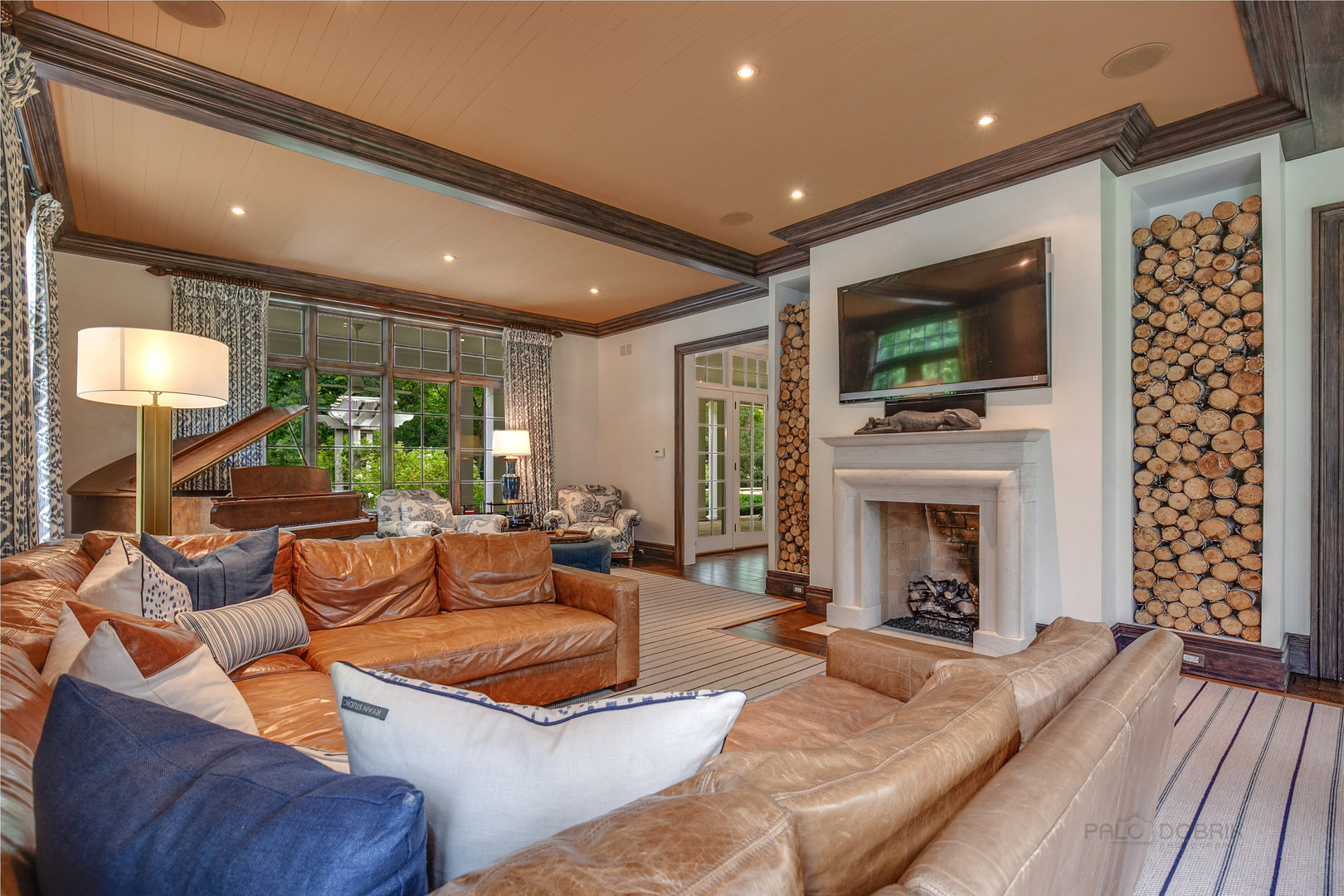 680 South Ridge Road Lake Forest, IL 60045 - Photo 4 of 44 a living room with furniture a flat screen tv and a fireplace