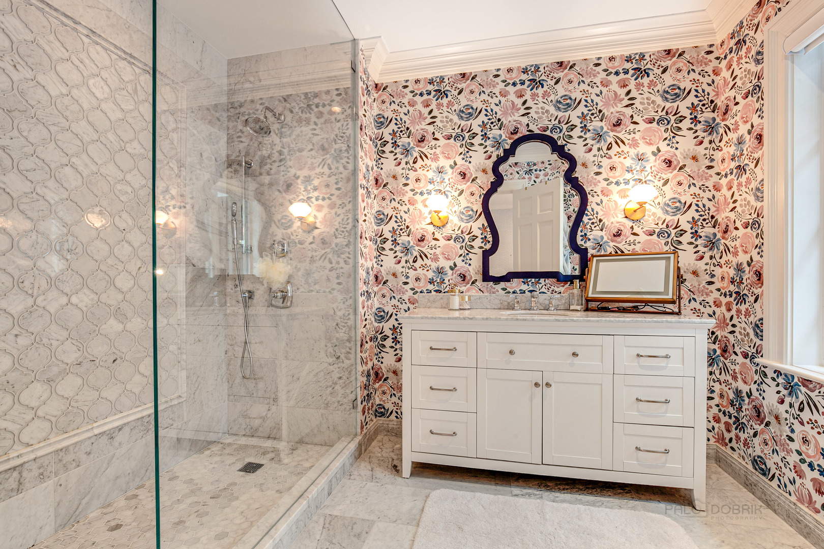 680 South Ridge Road Lake Forest, IL 60045 - Photo 33 of 44 a bathroom with a granite countertop sink a mirror and a shower