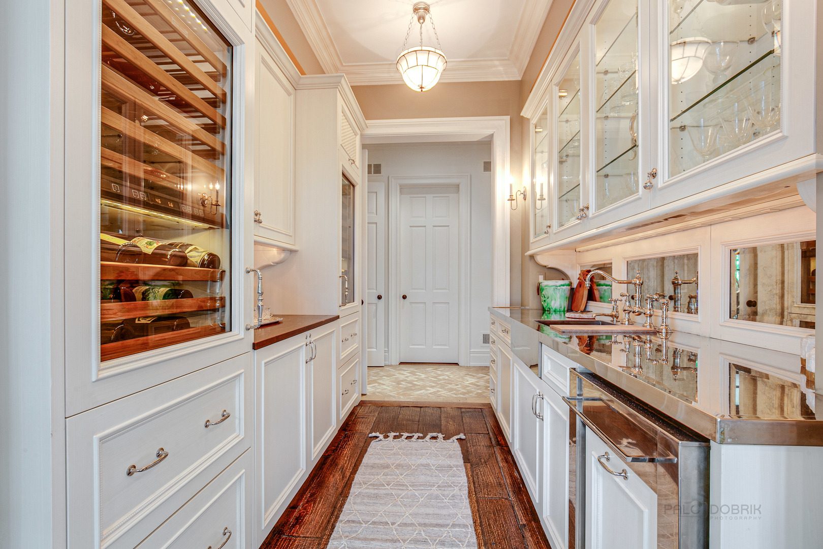 680 South Ridge Road Lake Forest, IL 60045 - Photo 9 of 44 a kitchen with cabinets and wooden floor