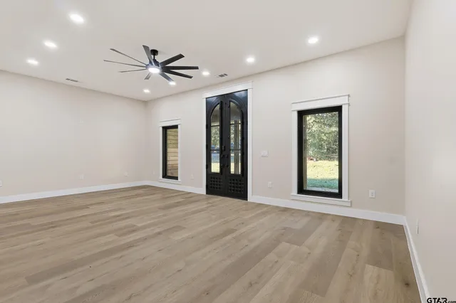 a view of storage and utility room with a window